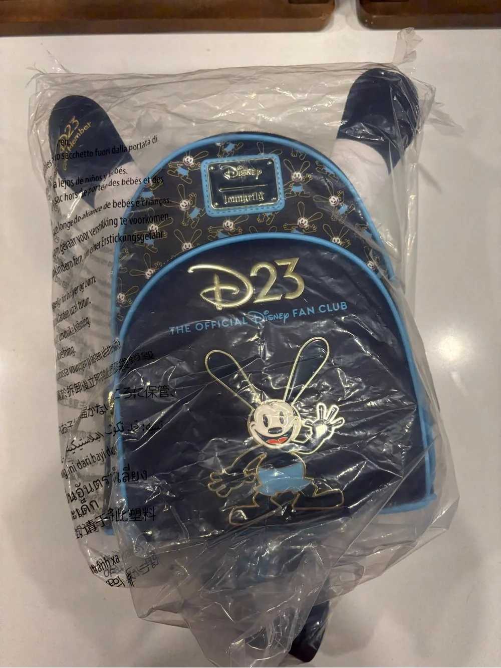 Loungefly D23 Oswald Navy and Light Blue Mini Backpack
